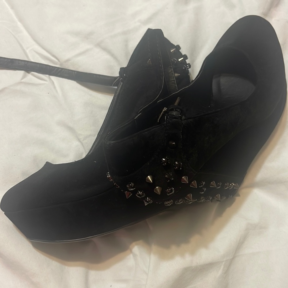 Black with stone on the back